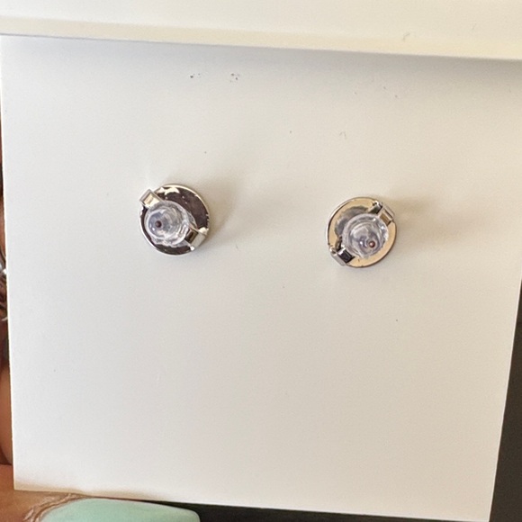 Tory Burch Two-Tone Gold & Silver Logo Stud Earrings - Picture 3 of 4